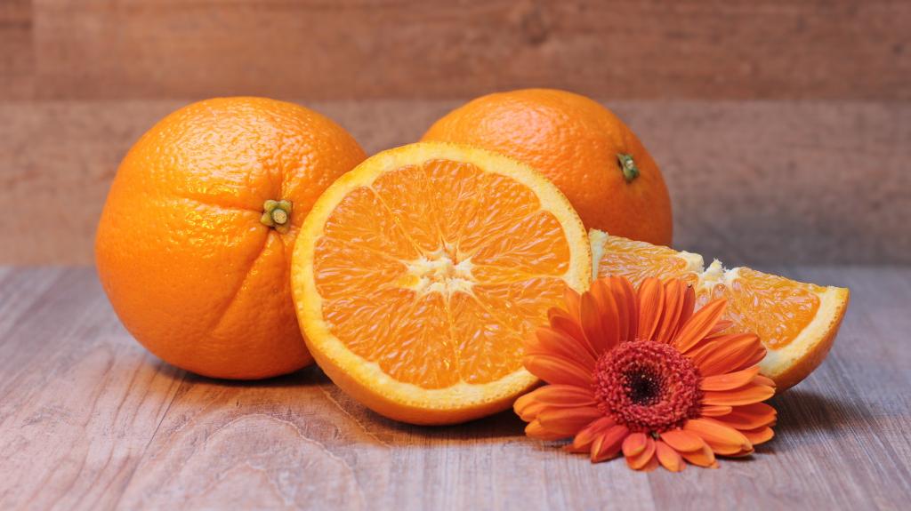 切两个橙色水果高清壁纸橙色水果