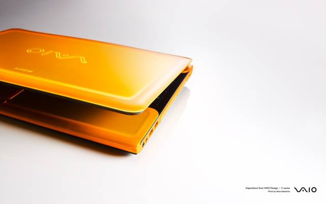 笔记本电脑,白色背景,橙色
