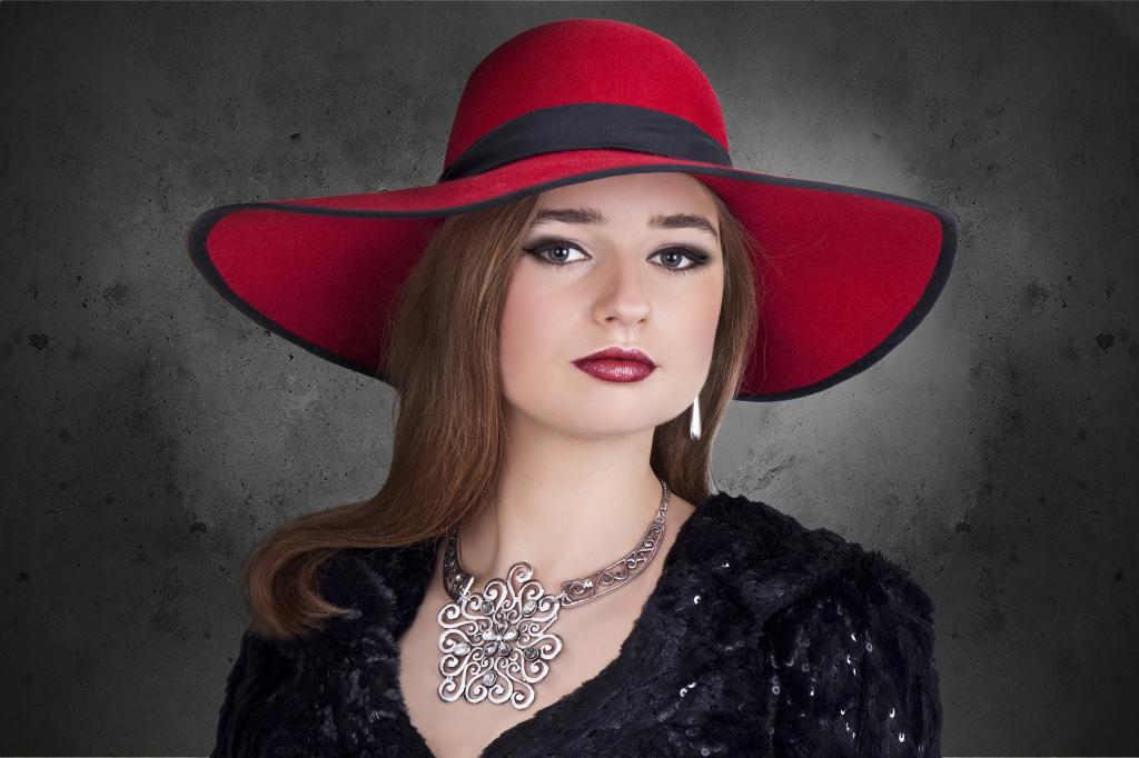 女人穿着红色的帽子和黑色汤匙领礼服高清壁纸